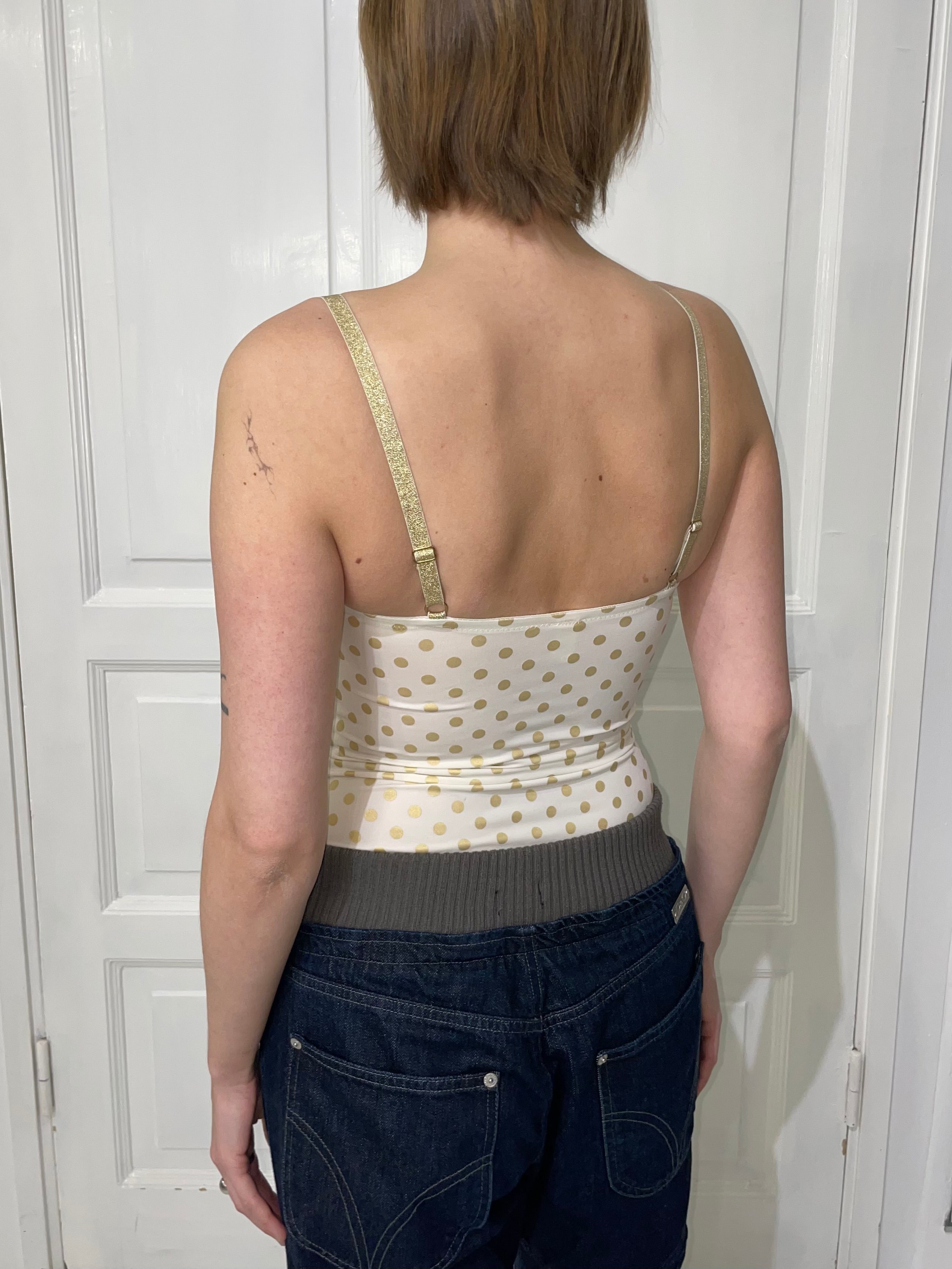 Pilkullinen korsettitoppi