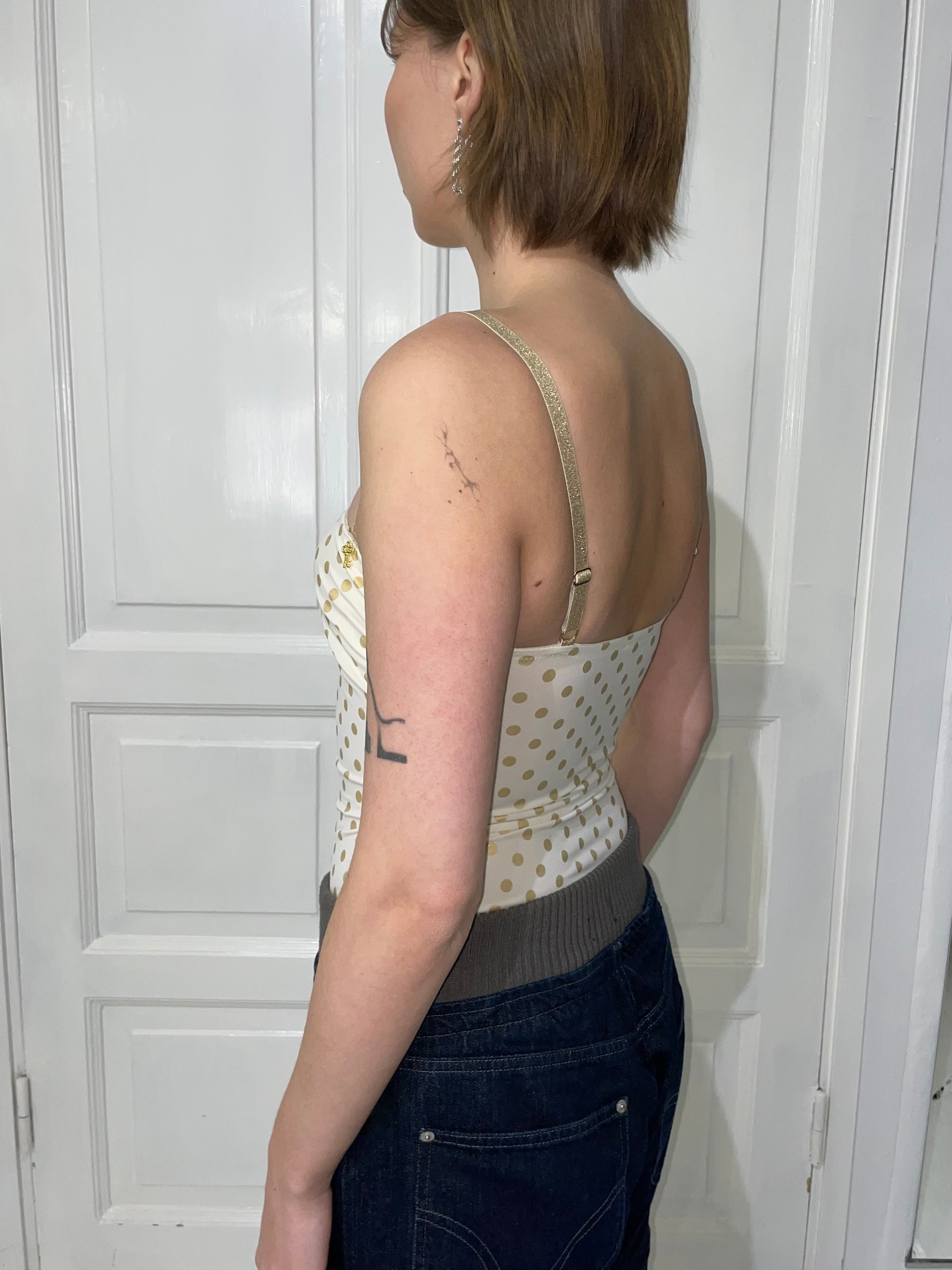 Pilkullinen korsettitoppi