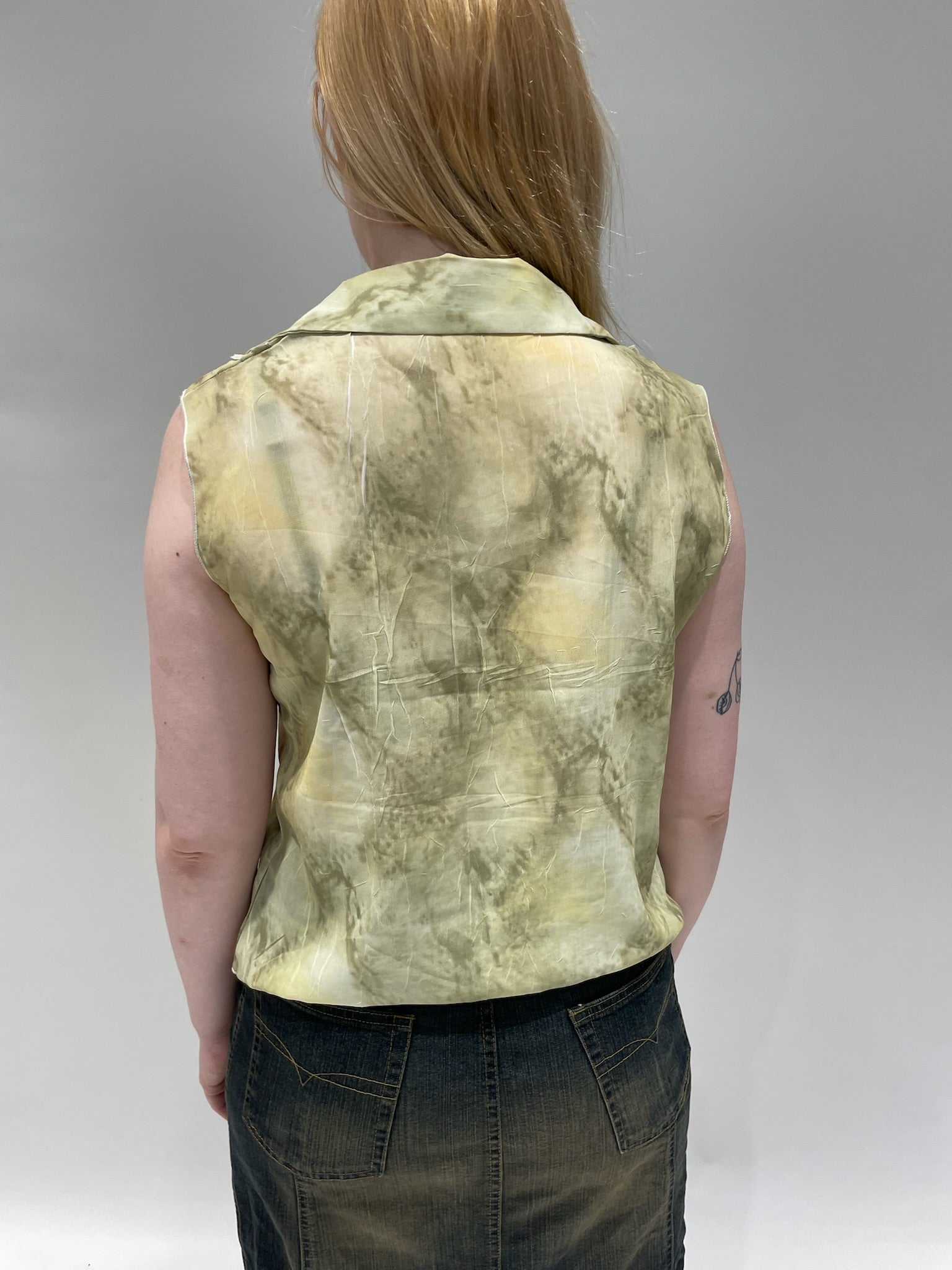 Kauluksellinen toppi