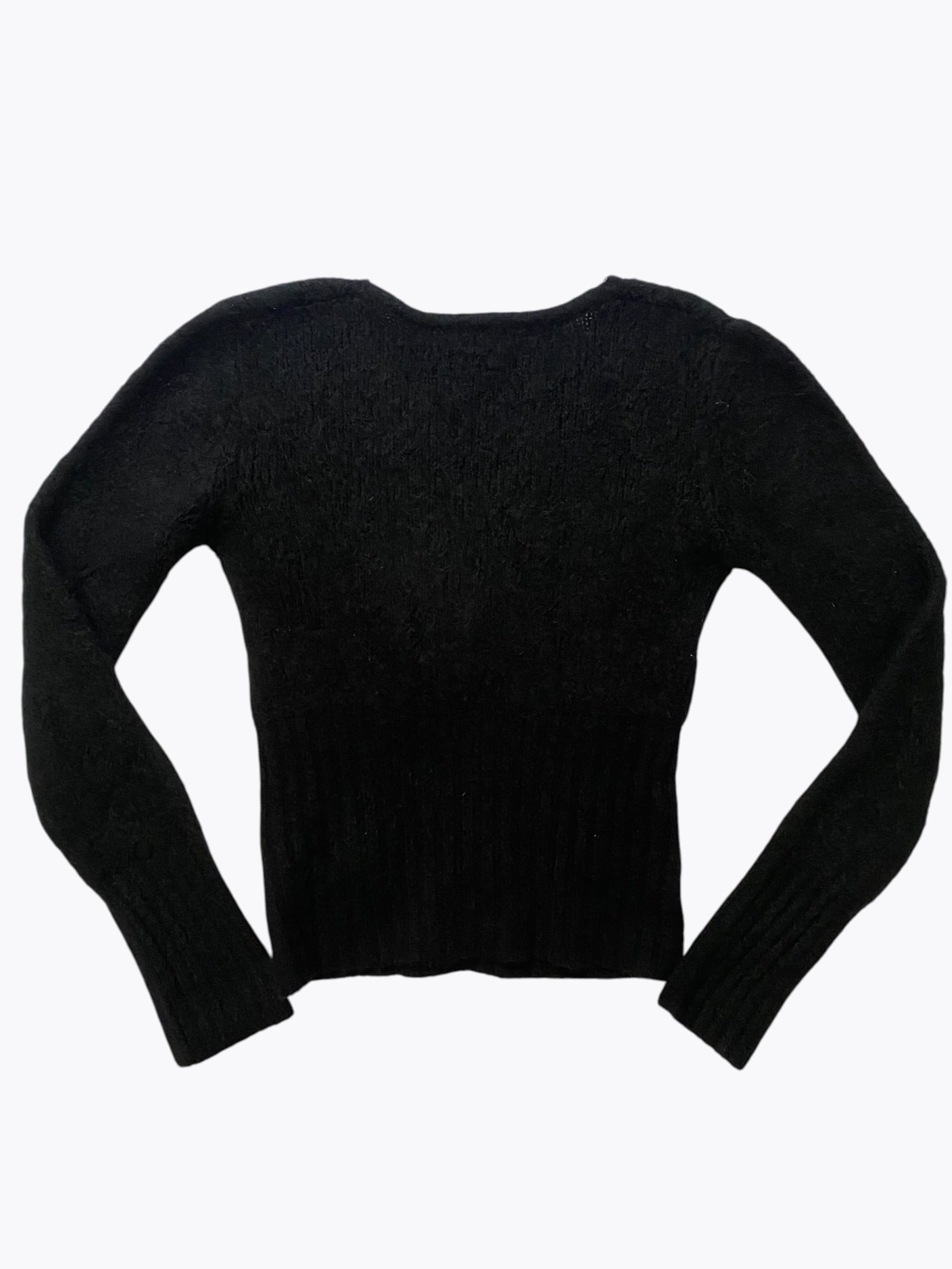 Knitted shirt with a buckle