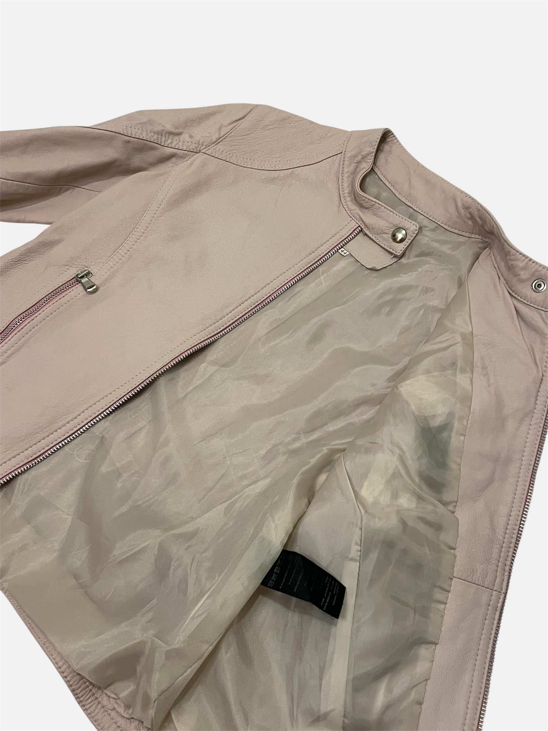 Vaaleanpunainen biker-takki